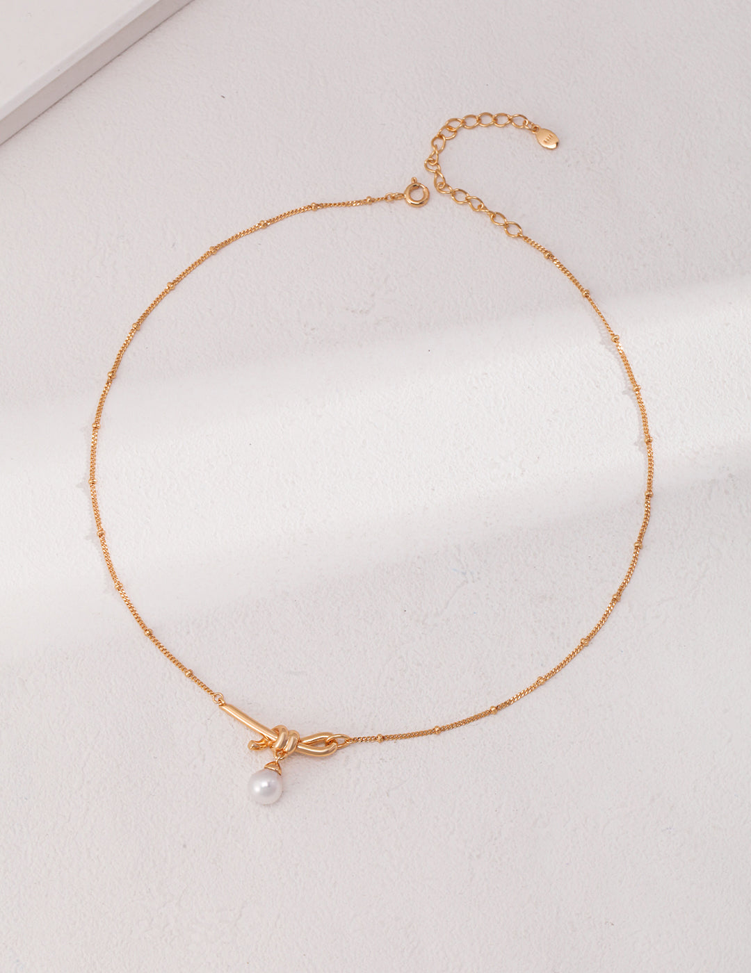 Knotted Pearl Necklace